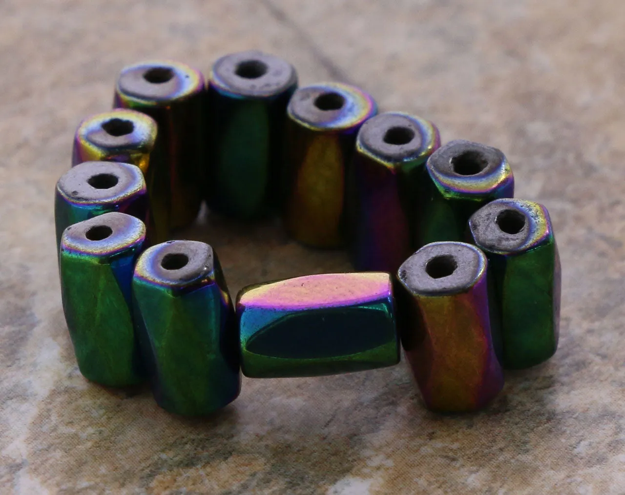 5x8mm Faceted Rainbow Tube Magnetic Hematite MH84