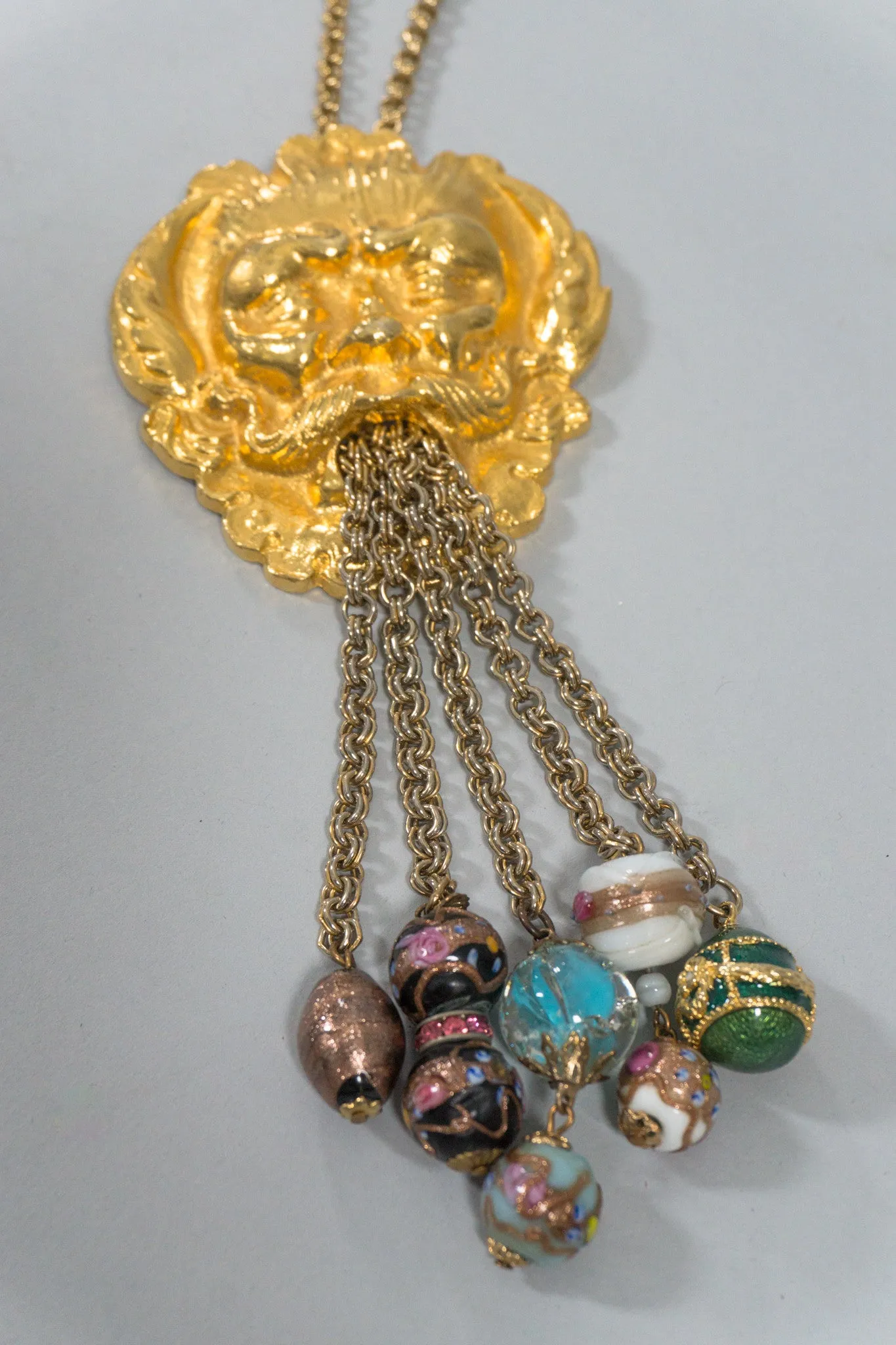 Face Relief Tassel Pendant