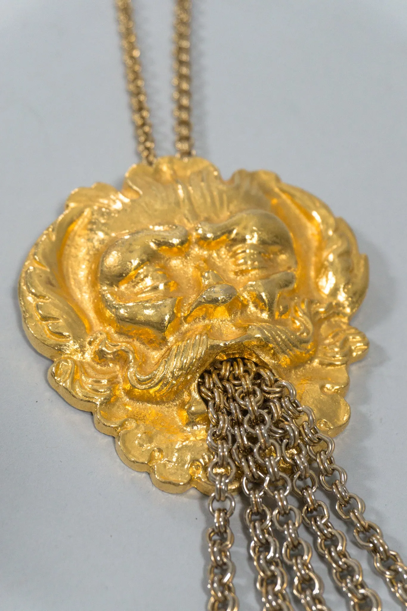 Face Relief Tassel Pendant