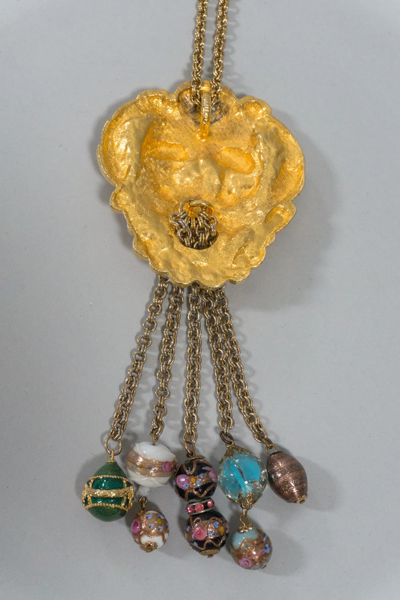 Face Relief Tassel Pendant