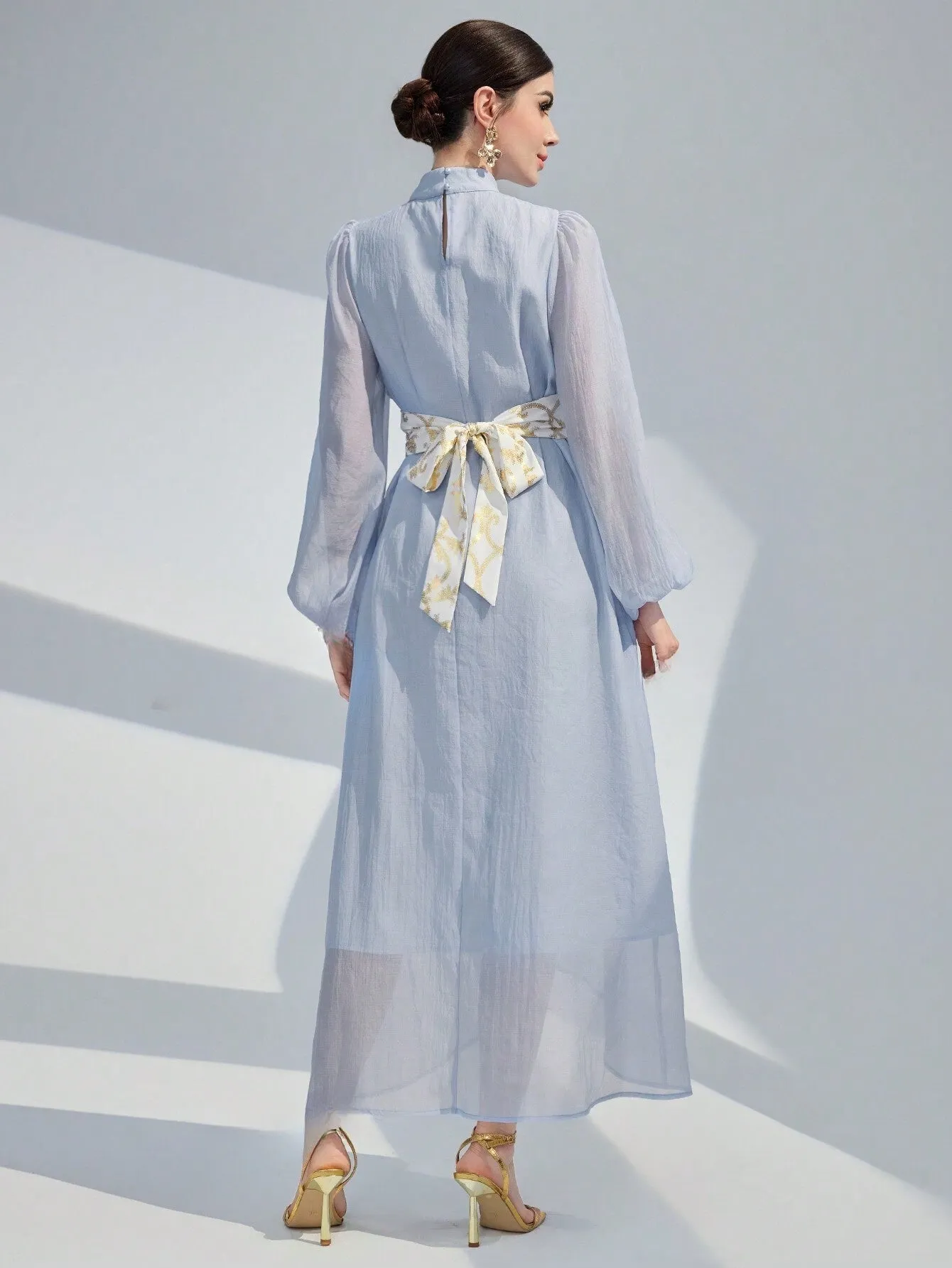 Modely Stand Collar Colorblock Lantern Sleeve Belted Dress With Plant Print