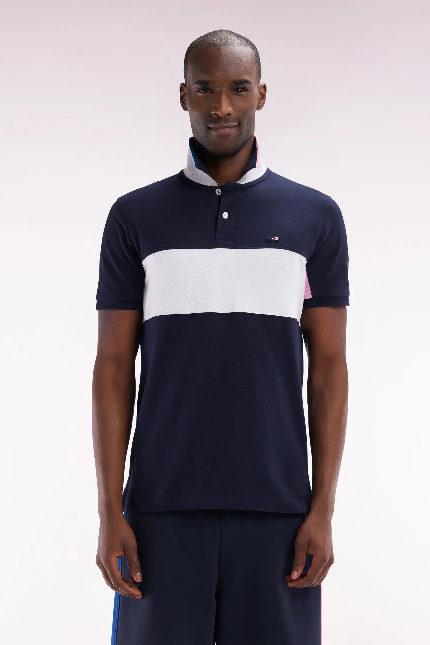 Polo à manches courtes colorblock en coton marine détails roses et blancs coupe droite