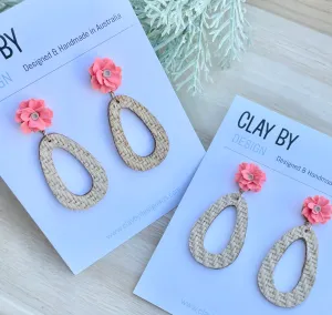Woven drop with bright coral flower stud tops